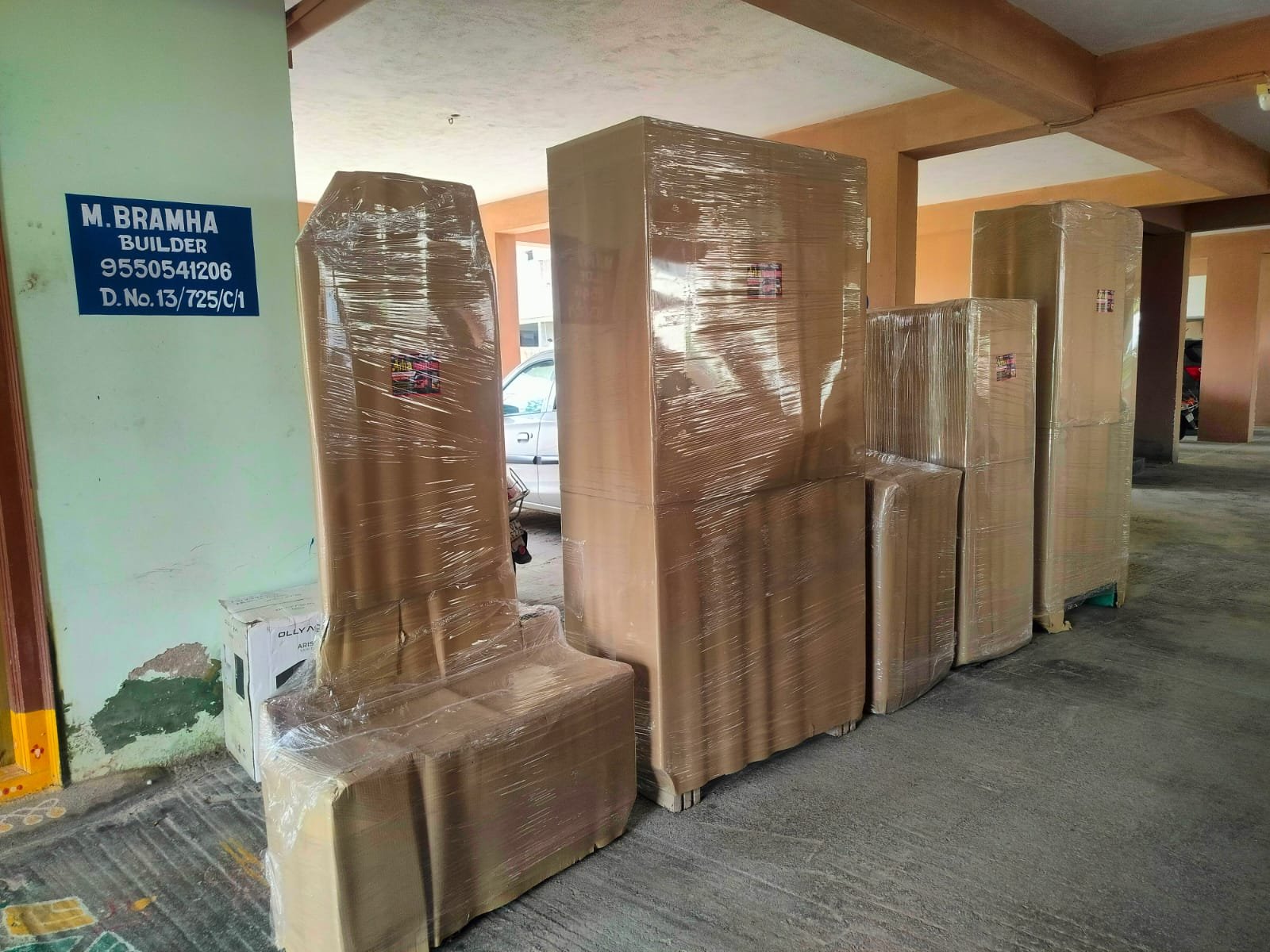 Tall cupboards and furniture packed with protective film