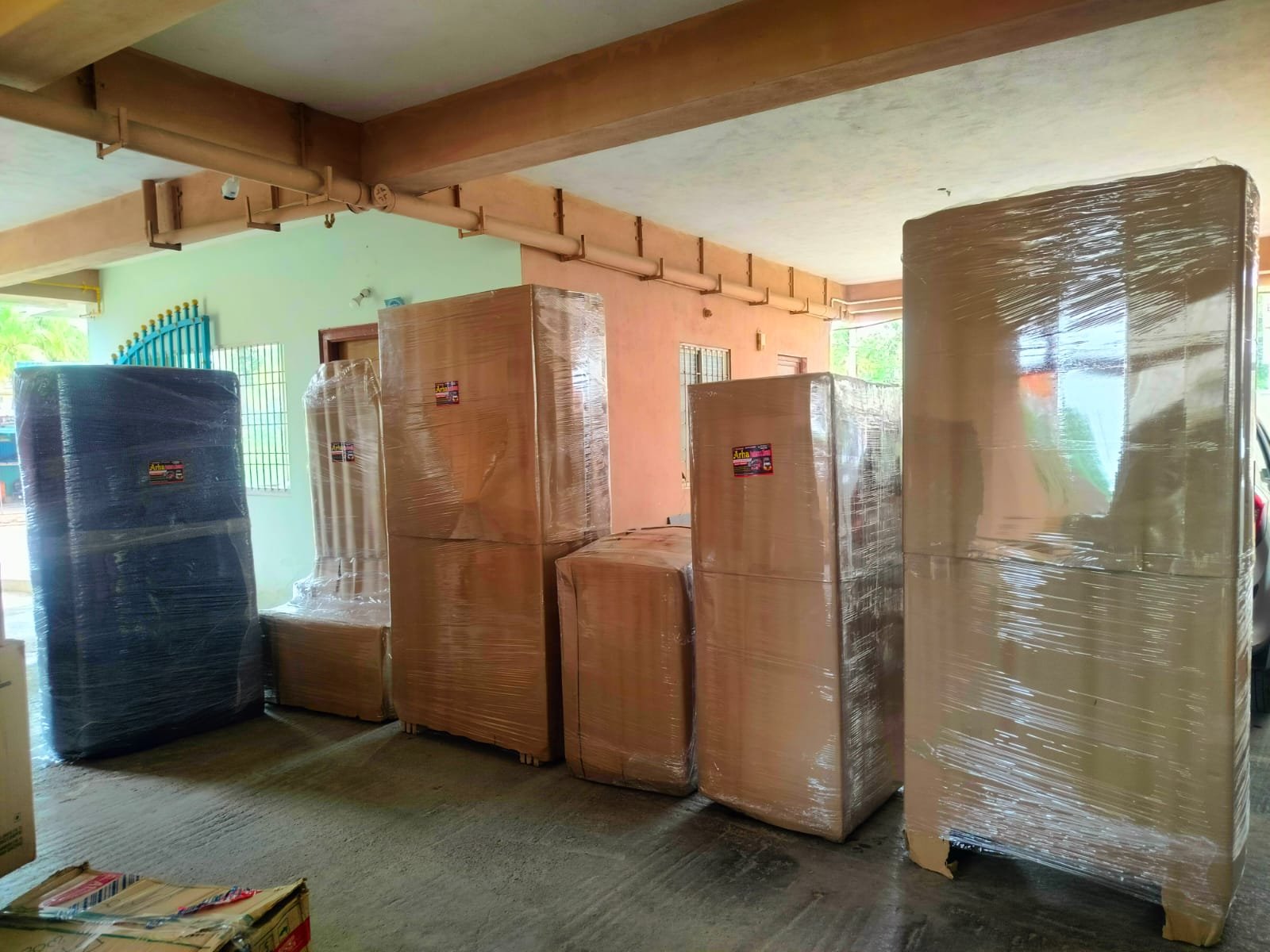 Multiple household items packed and arranged before loading