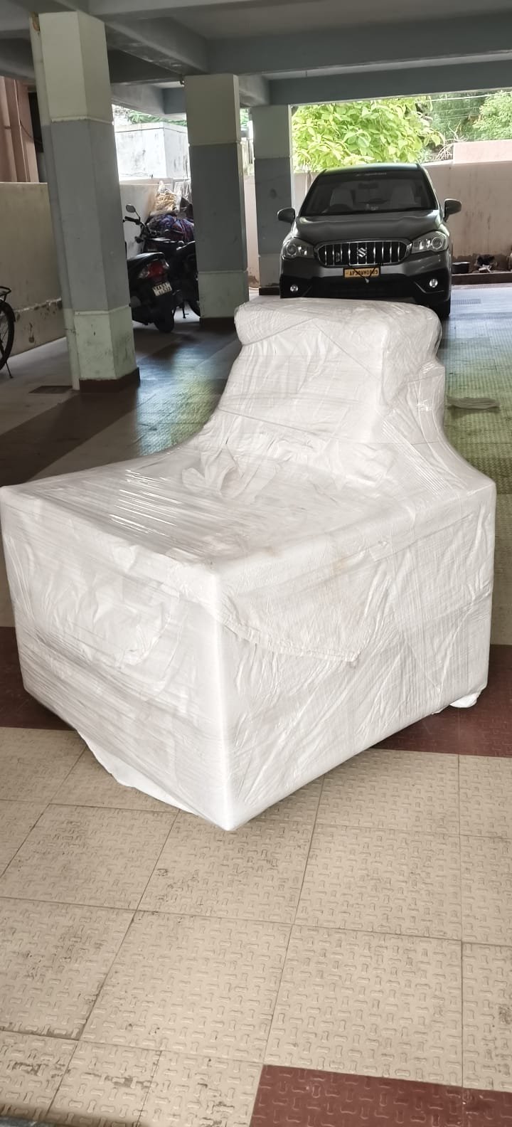 Large chair wrapped and ready for transport