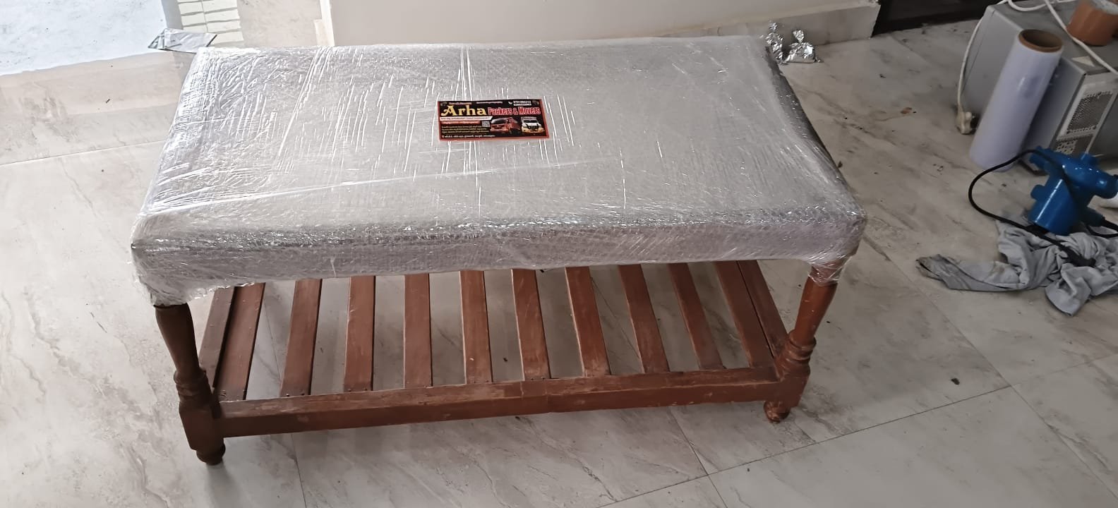 Bubble-wrapped table top with ARHA label