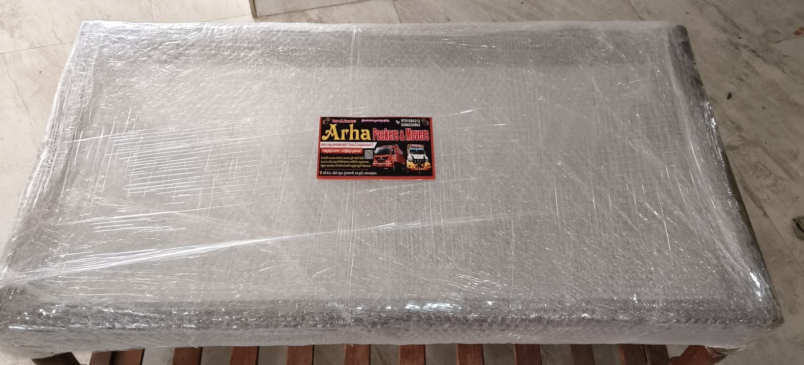 Bubble-wrapped furniture with company label